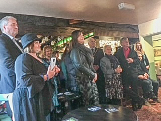 Photo of wellwishers at the ceremony to present John Mills with his MBE in Winster, Derbyshire